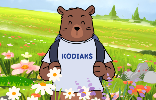 Kody smiling happily in the meadows